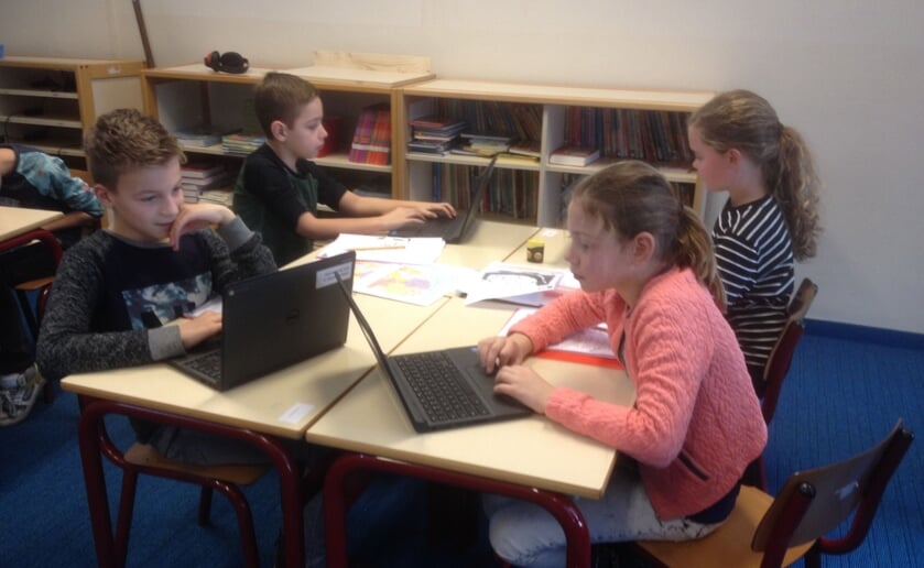 De laptop is een niet meer weg te denken hulpmiddel op school. FOTO: Stock PG.