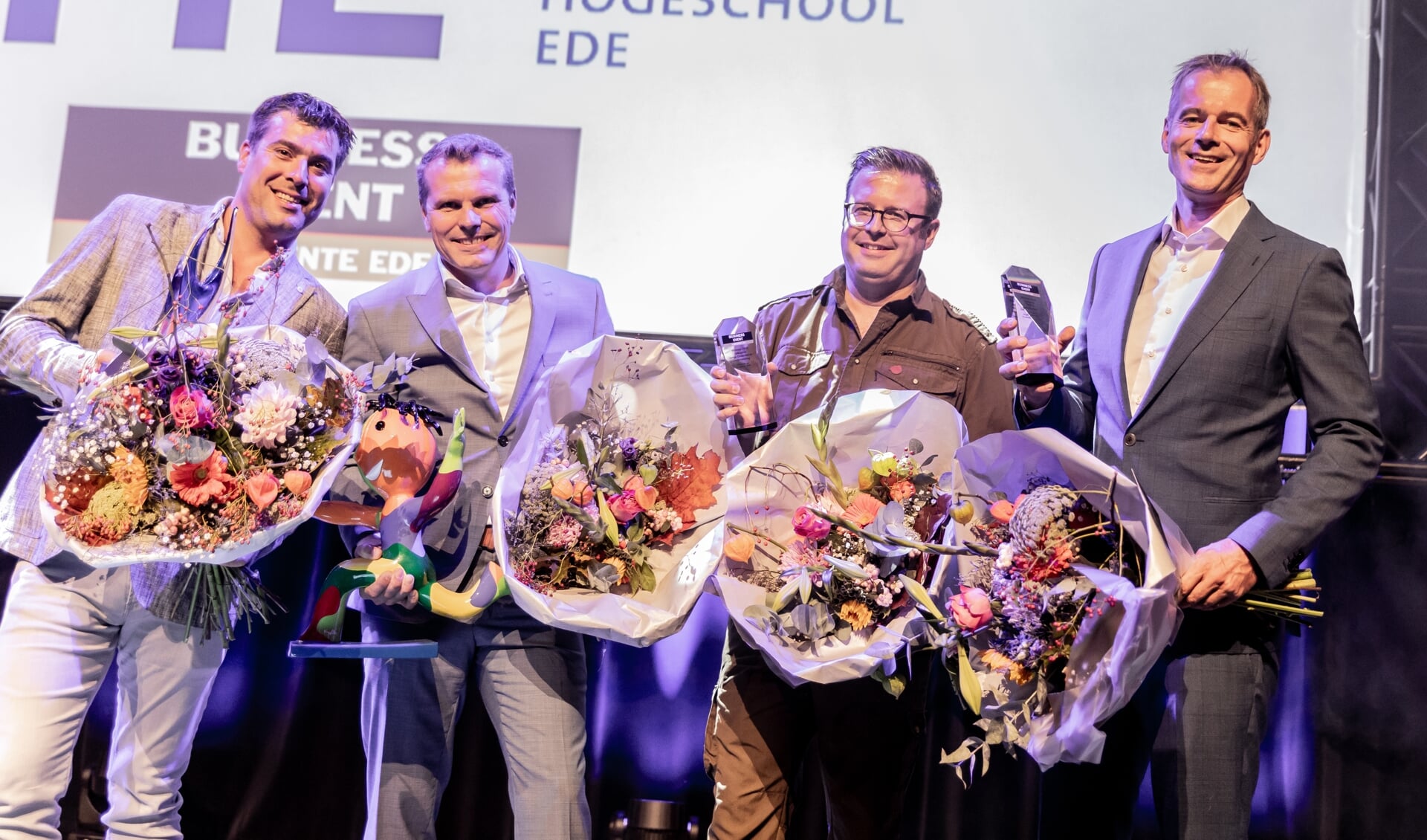 De winnaars van het Business Event gemeente Ede 2018. Van links naar rechts: Albert Meeuwissen (Albers Zeilmakerij), Harry Brouwer (Emri Services), Leendert Houweling (dierenpreparateur) en Hans Bom (hotel De Sterrenberg).