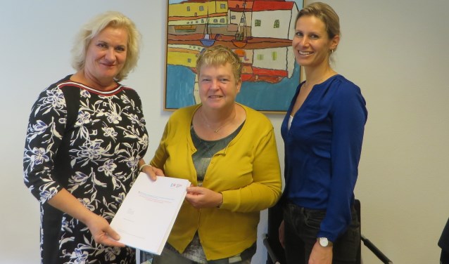 Wethouder Wil Kosterman en onderzoekers van het Lectoraat Jeugd