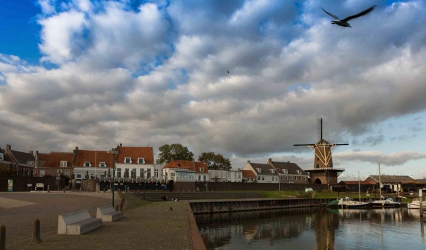 <p>De rivier, de haven en het zicht op de stad</p>