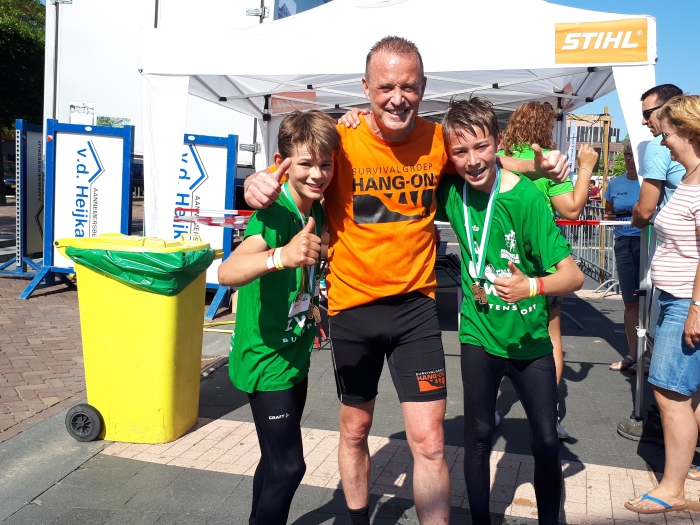 Trainer Erik de Heer met Teije en Niels