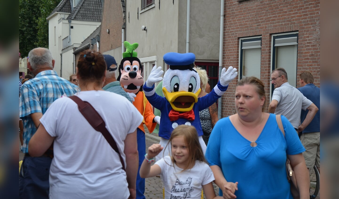 Donald, Goofy en Mickey op de kermis