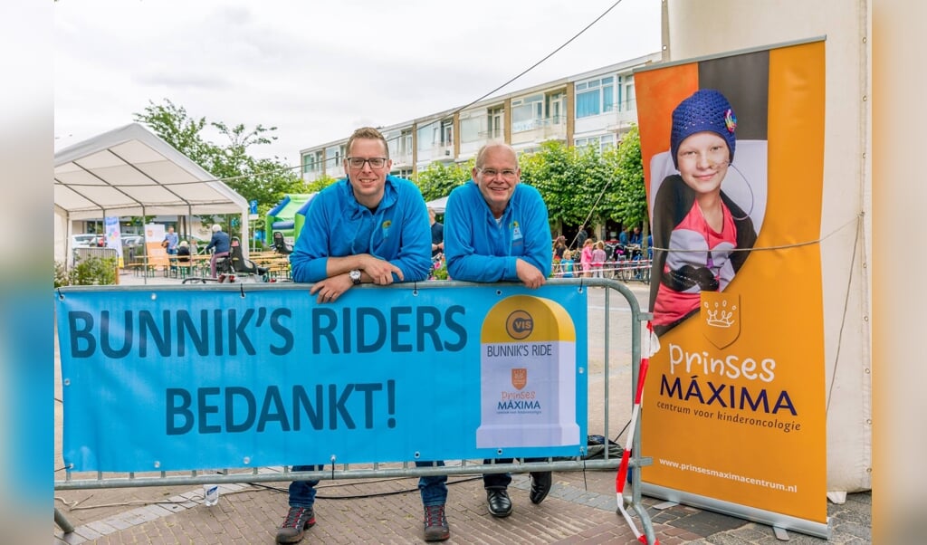 Chris de Graaf en Gerrit van Heusden zijn trots op het succes van Bunnik's Ride en de opbrengst voor het Prinses Máxima Centrum.
