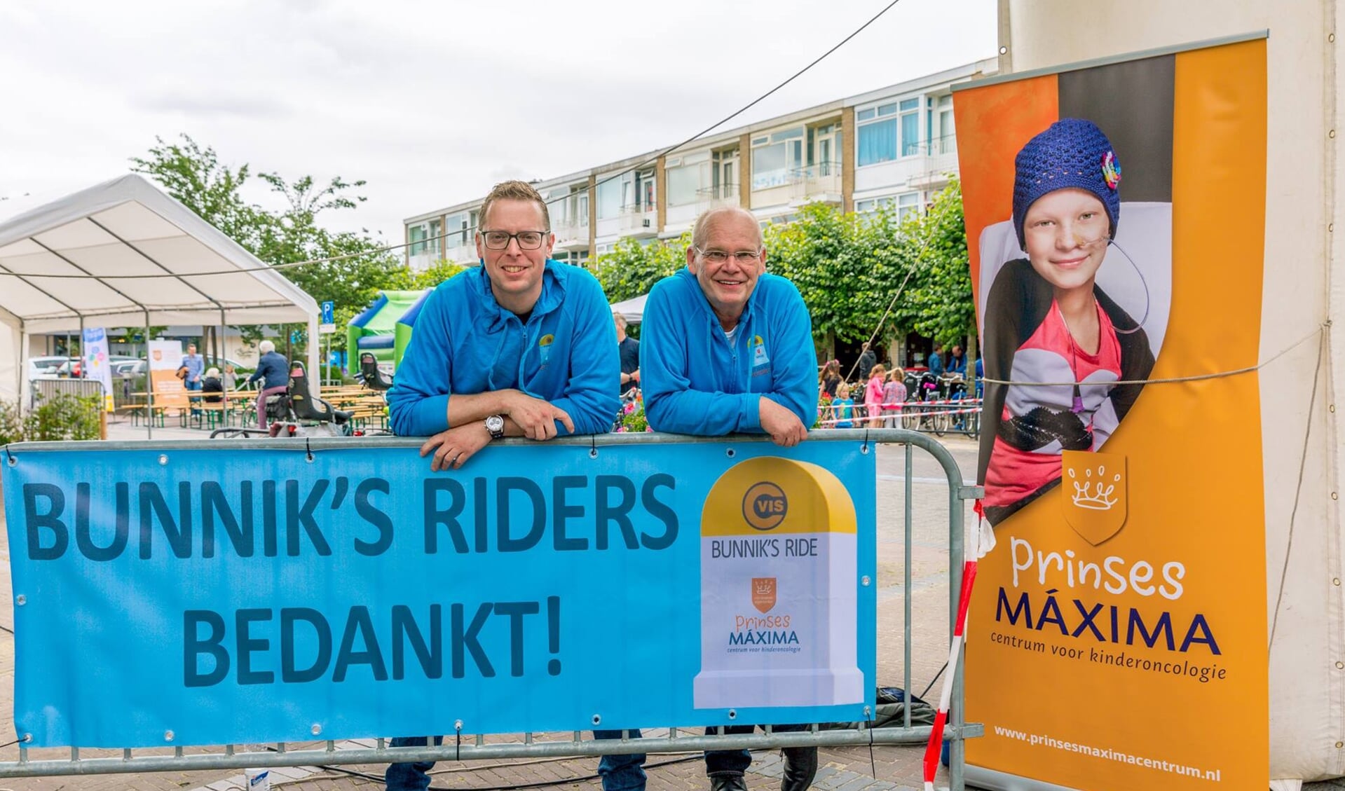 Chris de Graaf en Gerrit van Heusden zijn trots op het succes van Bunnik's Ride en de opbrengst voor het Prinses Máxima Centrum.