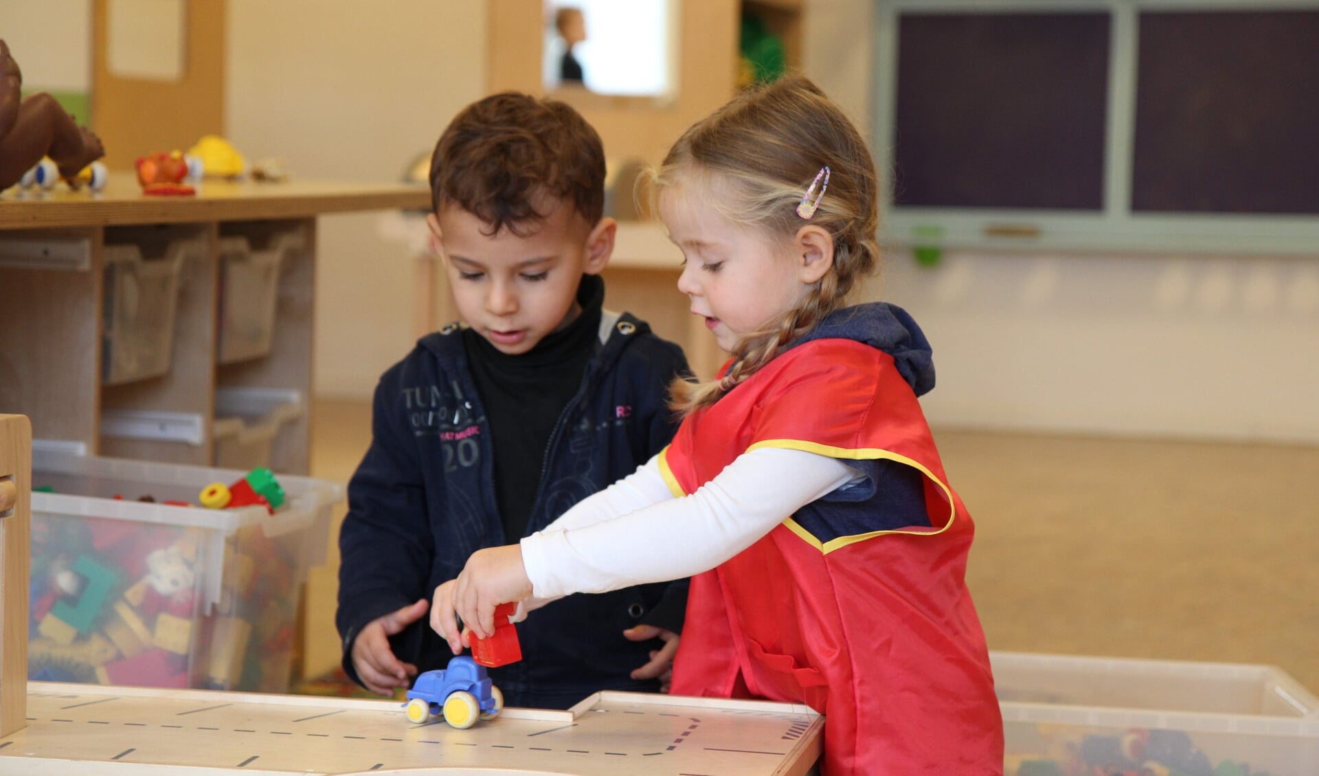 Kinderen leren bij Bink delen, samen spelen en leren omgaan met vreugde en teleurstelling.