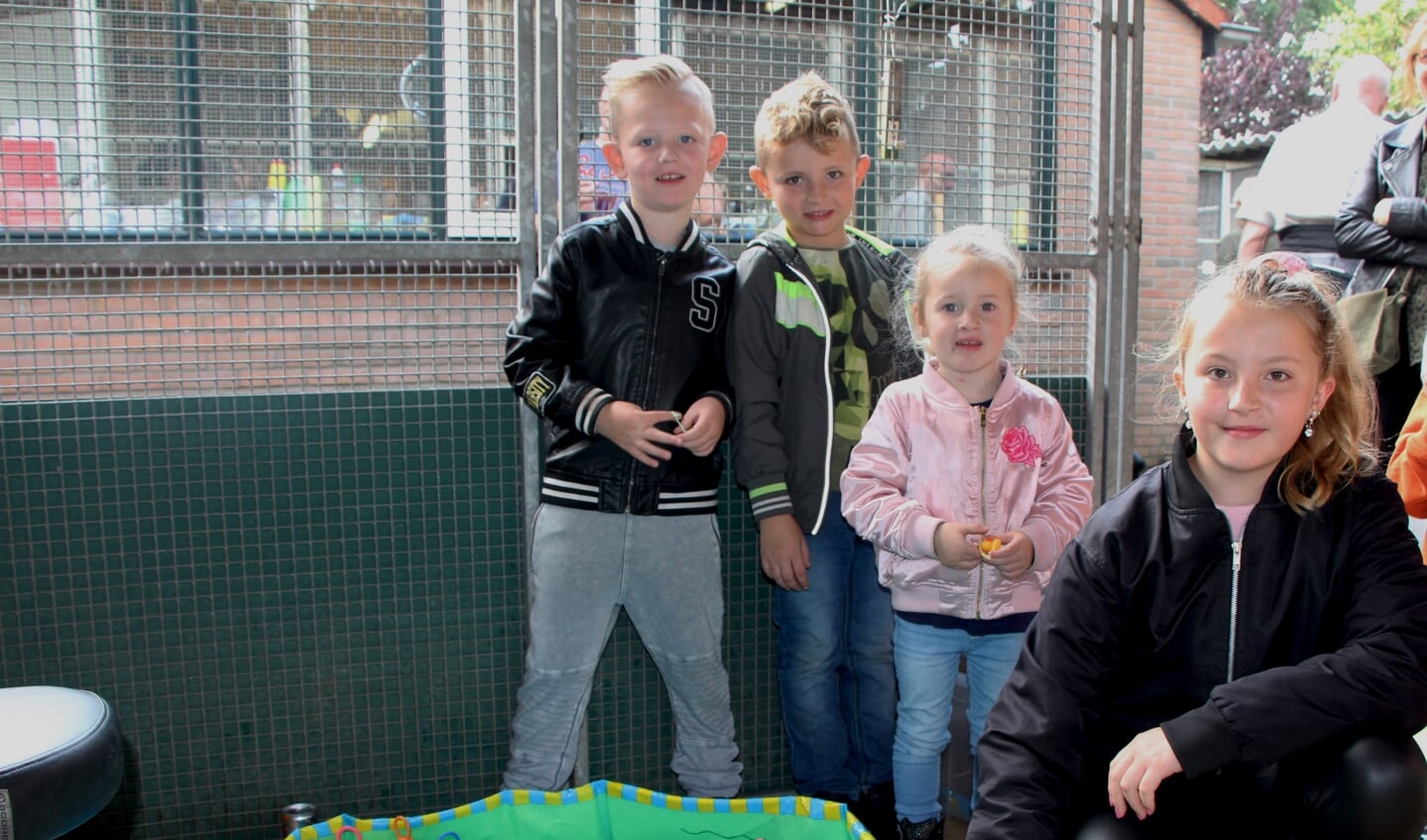 Hannes (4), Javy (7), Talitha (2) en Chanel (11) deden actief mee met de spelletjes op de open dag
