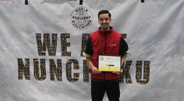 Ricardo de Jong met zijn diploma 3e dan