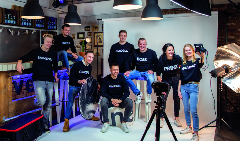 Het team van Veconet in de eigen fotostudio.