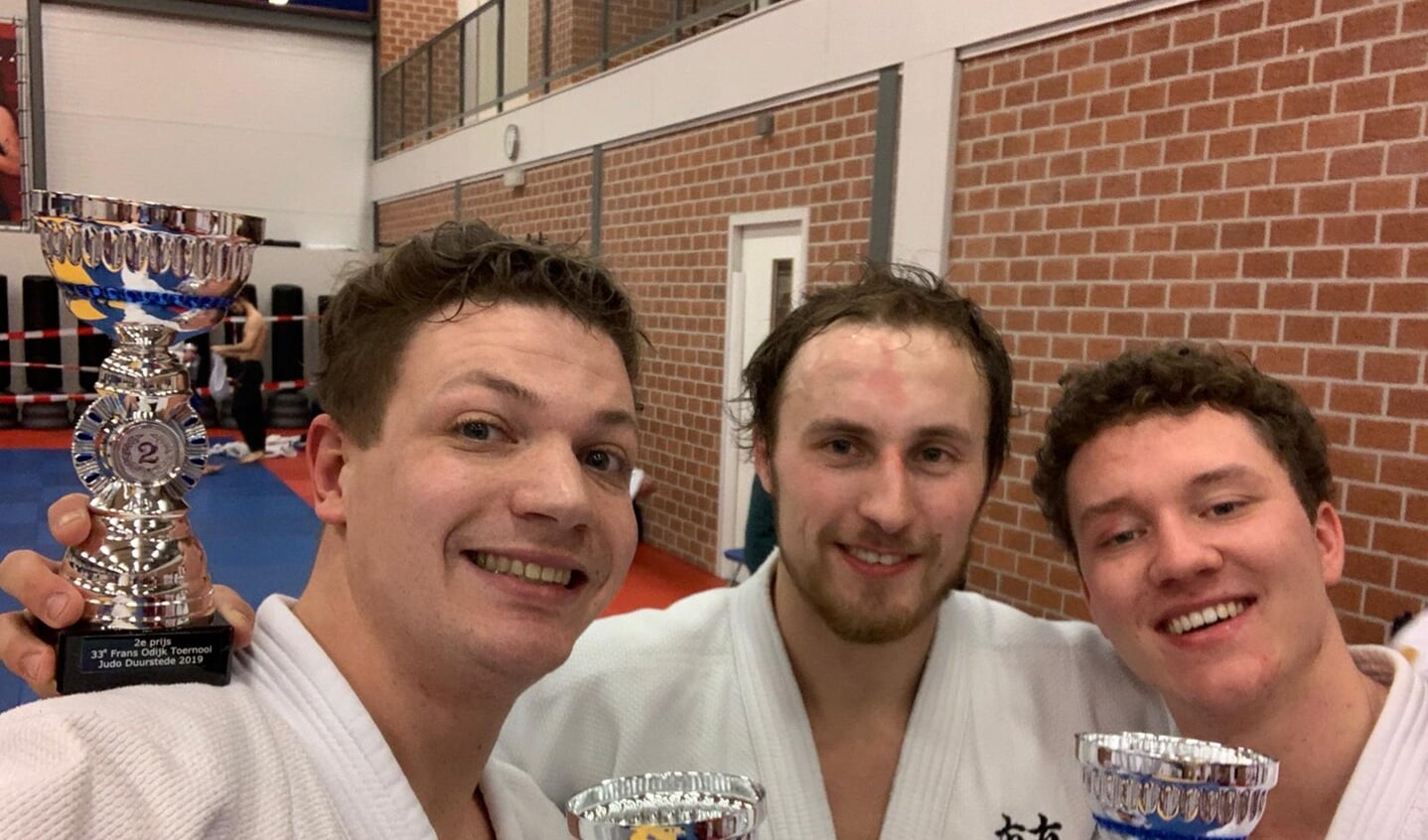 Hans, Menno en Bradley met hun beker