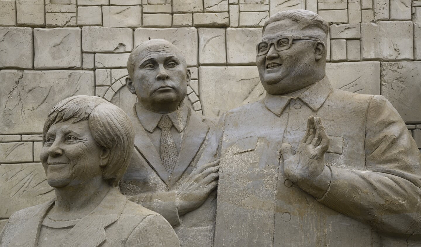 Merkel, Poetin en Kim Jong-un.