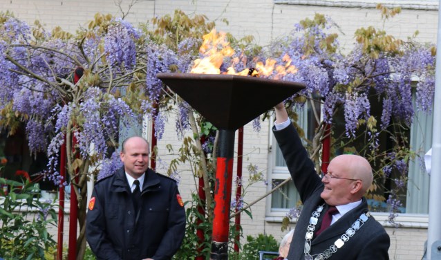 Ontsteken van het bevrijdingsvuur door de burgemeester