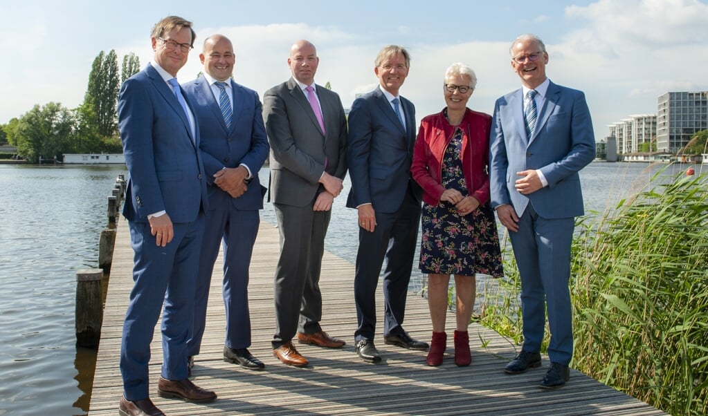 Het nieuwe dagelijks bestuur van Waterschap Amstel Gooi en Vecht met in midden Sander Mager.