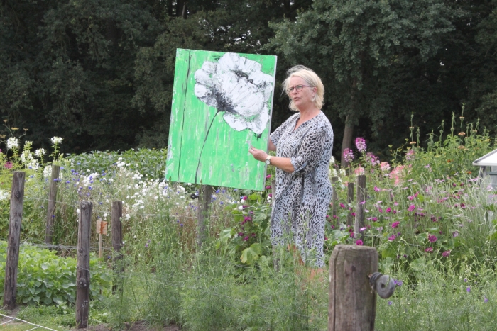 schilderes in de pluktuin op de Stoutenburgerlaan.