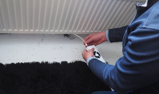 Speedcomfort maakt kleine ventilatoren die onder een radiator worden bevestigd.