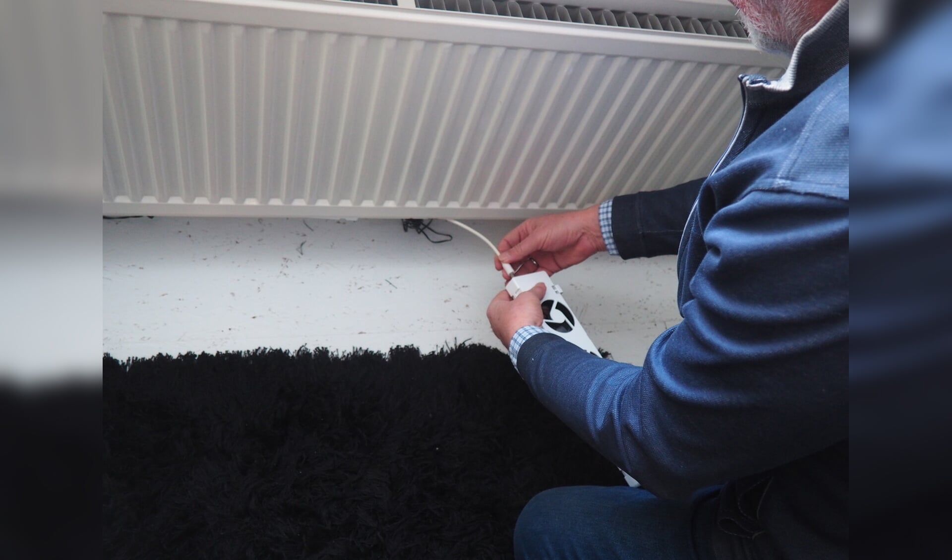 Speedcomfort maakt kleine ventilatoren die onder een radiator worden bevestigd. 