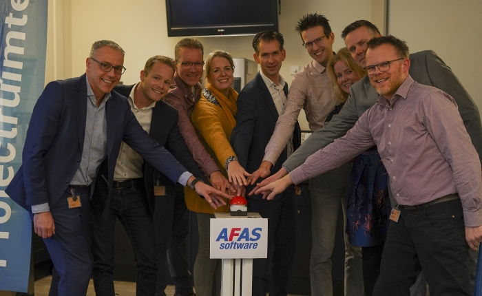 Met een symbolische druk op de rode knop is AFAS live in St Jansdal