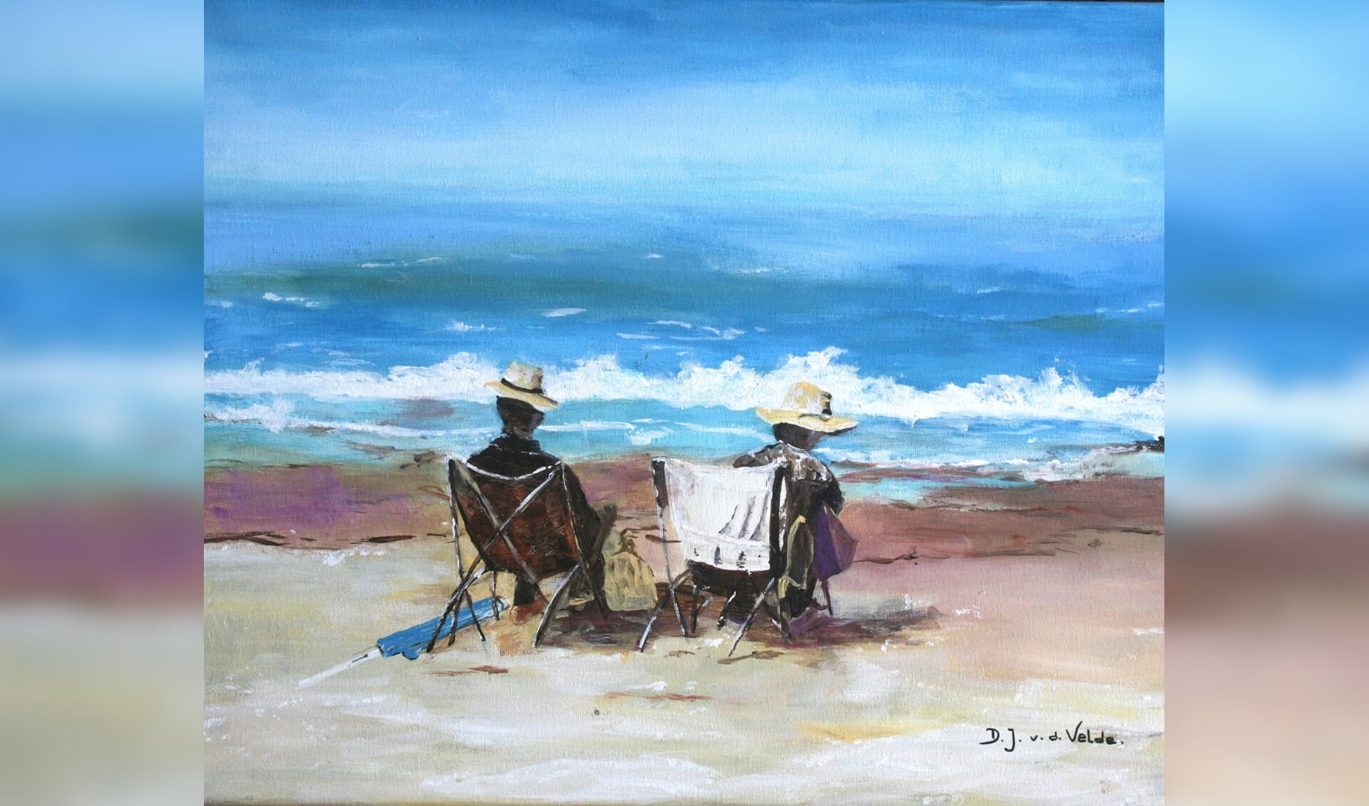echtpaar zittend op het strand