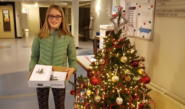 <p>Julie Eijgensteijn vindt het leuk om te schrijven en gaf daarom een decemberkrantje uit.</p>