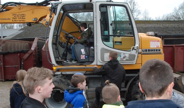 Even op de stoel van de kraanmachinist.