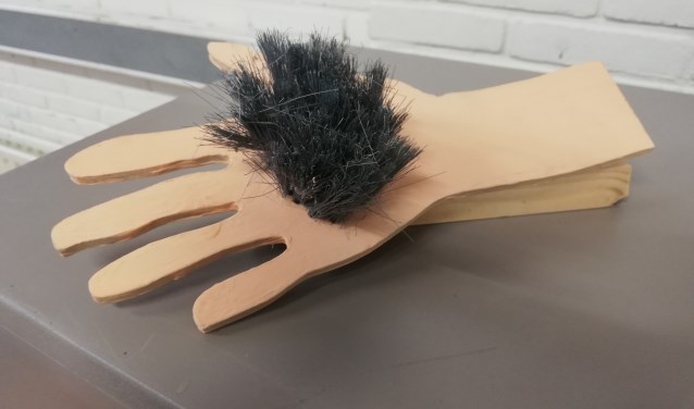 Een ontwerp van een bijzondere handveger.