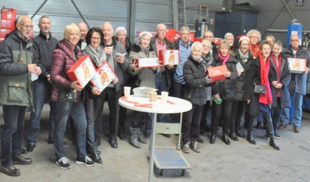 Zonnebloem vrijwilligers bezig met het distributieplan van de RIKI pakketten.