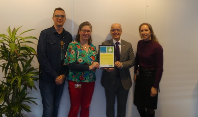 Op de foto staan v.l.n.r.: Michel de Bruin (vrijwilligerscoördinator), Monica van den Berg (vrijwilligerscoördinator), Peter de Wit (bestuurder) en Annelies Lodder (vrijwilligerscoördinator).