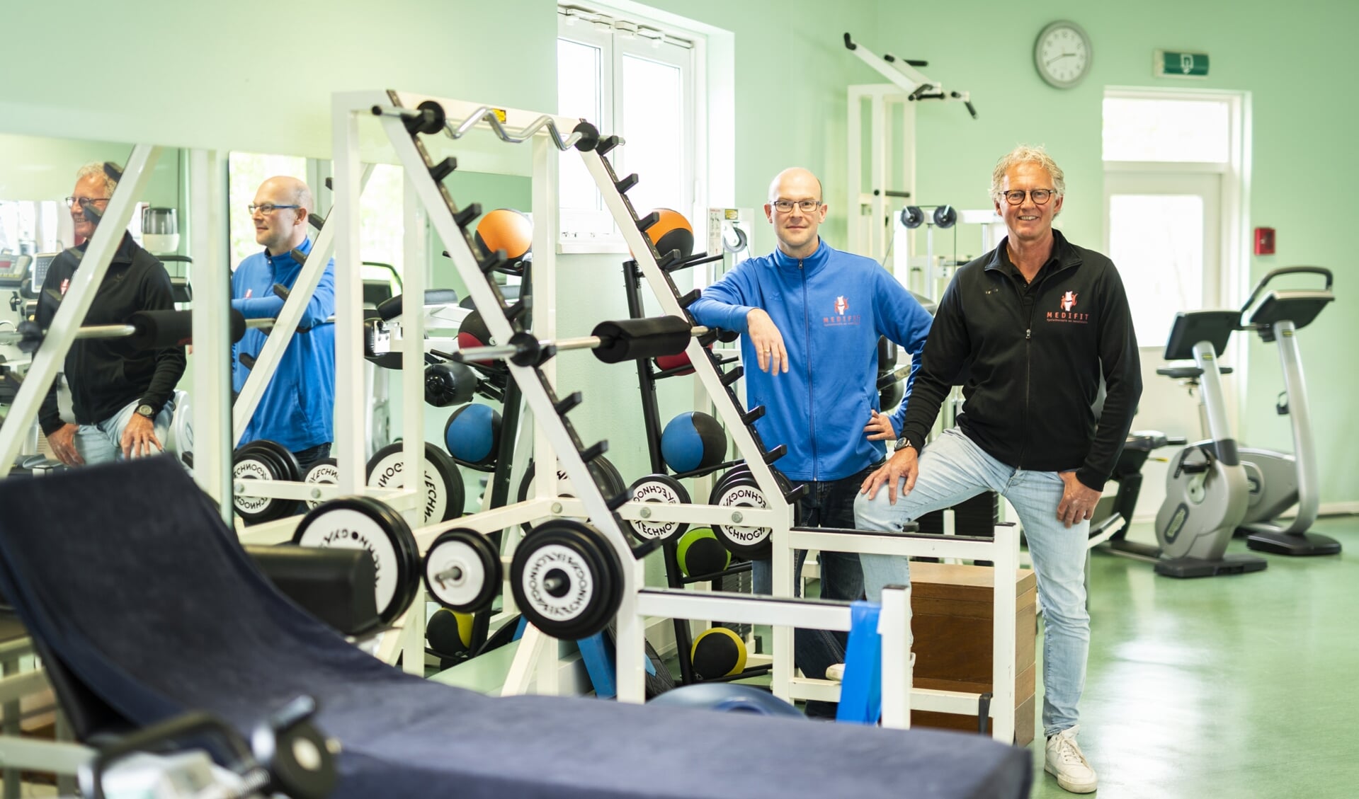 Marcel Appelman en Ronald Uyterwaal in de fitnessruimte van Medifit in Barneveld. (archieffoto)