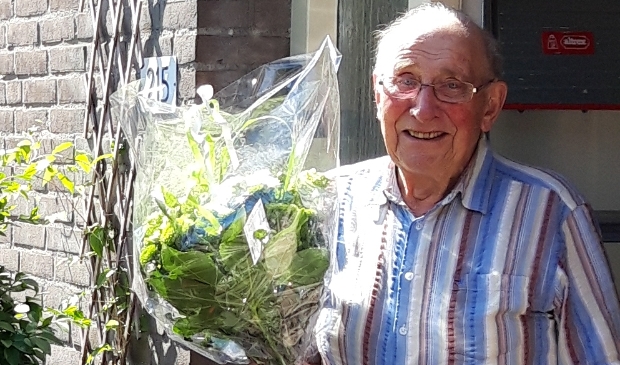 Bloemen voor de jubilaris.