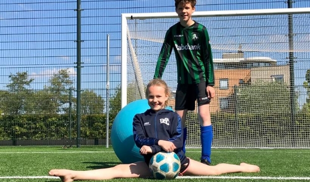 Turnsters op het voetbalveld bij Alliance, een geslaagd voorbeeld van samenwerking.