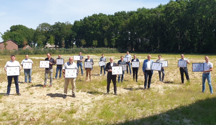 Uitreiking van de certificaten.