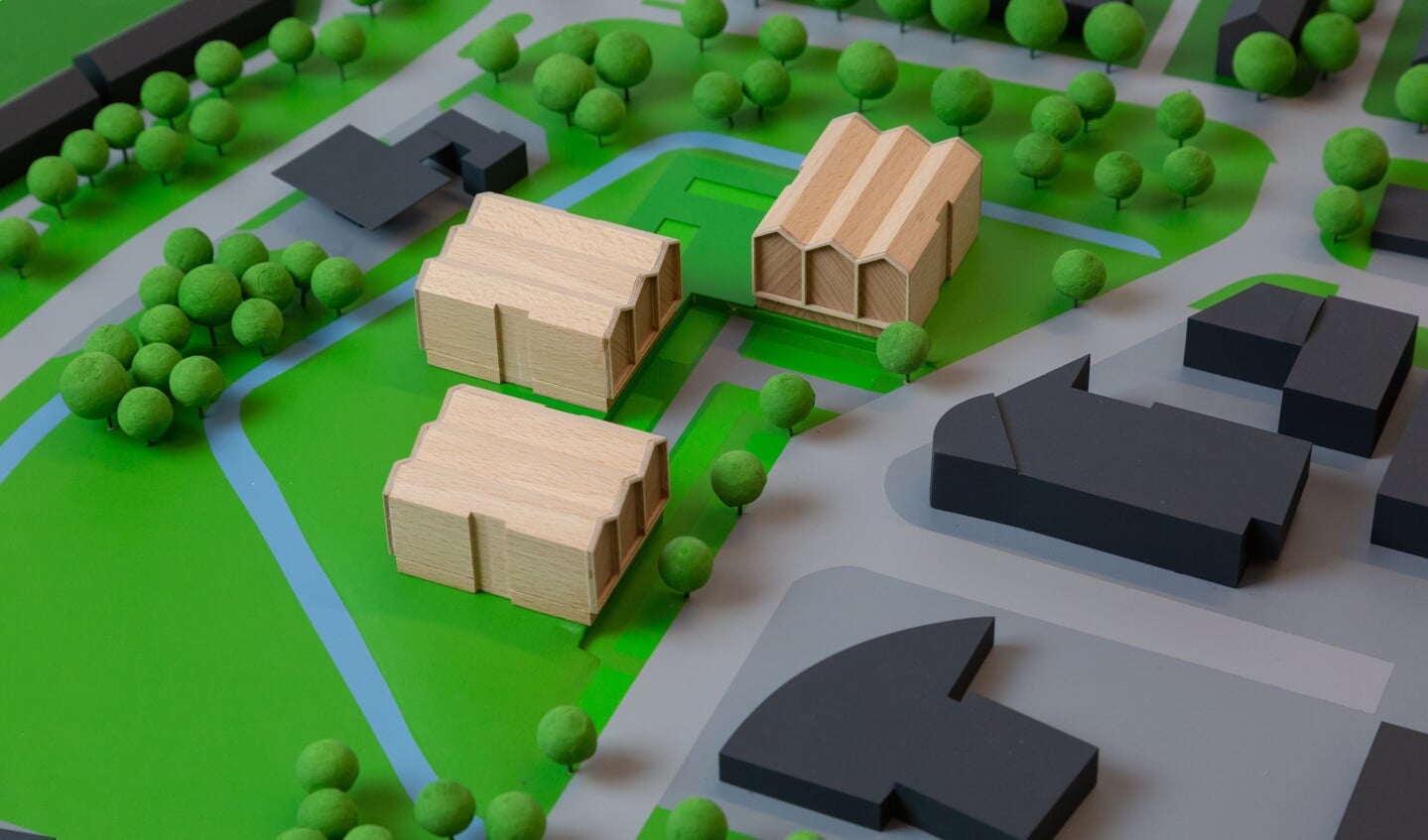 Een maquette van de drie woontorens die nu definitief niet worden gebouwd,