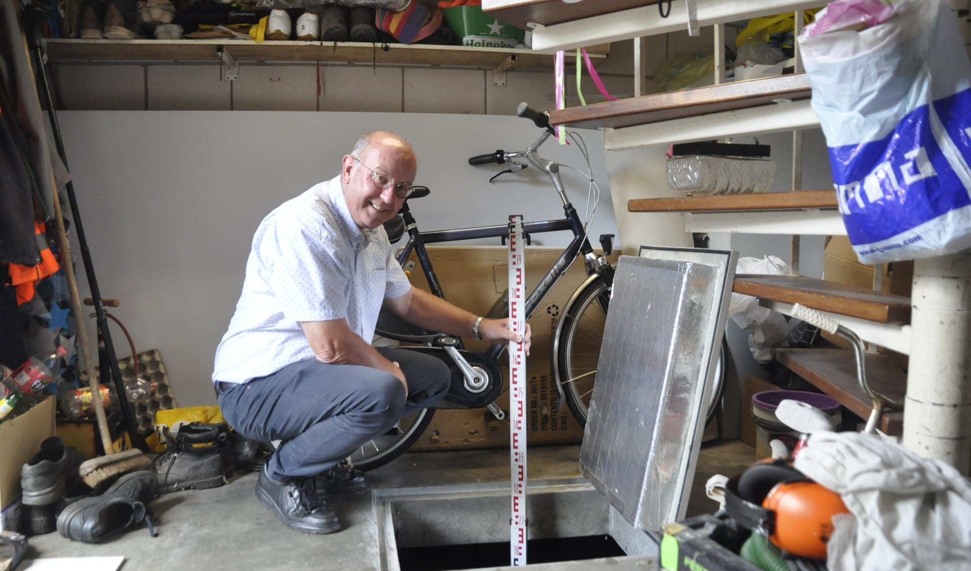 Gert Ploeg heeft een waterbassin van 21.000 liter onder zijn garage aangelegd.