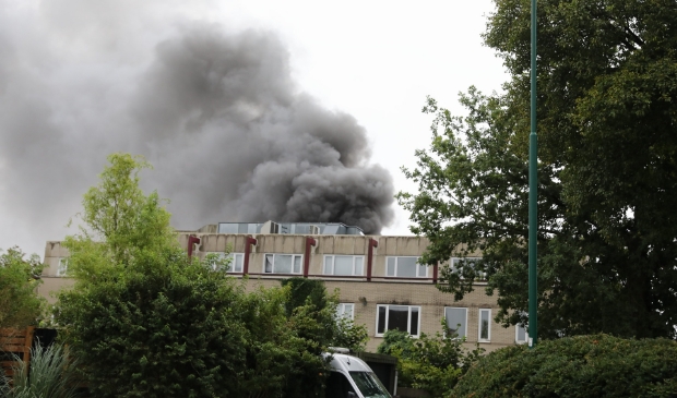 <p>De rook was van afstand te zien.</p>