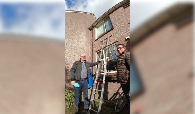 Een ladder voor het grijpen, poortdeur niet op slot
