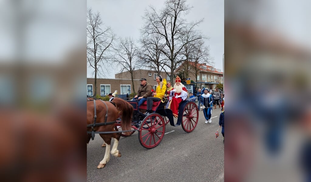 Met Sinterklaas mee in de koets.