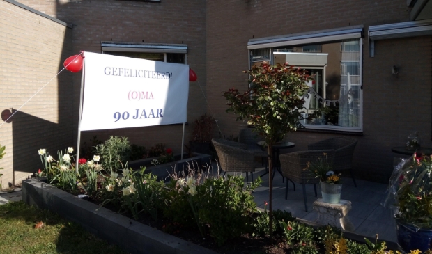 Spandoek verjaardag in corona tijd.