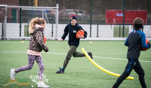 Enthousiaste kinderen tijdens een activiteit