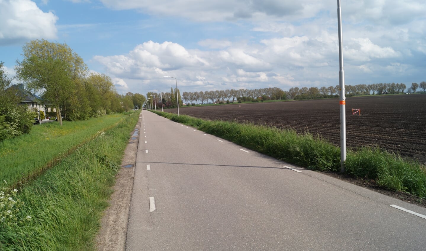 Het gebied waar De Scheg-Oost gebouwd zal worden met in de verte de Bovenkerkerweg.