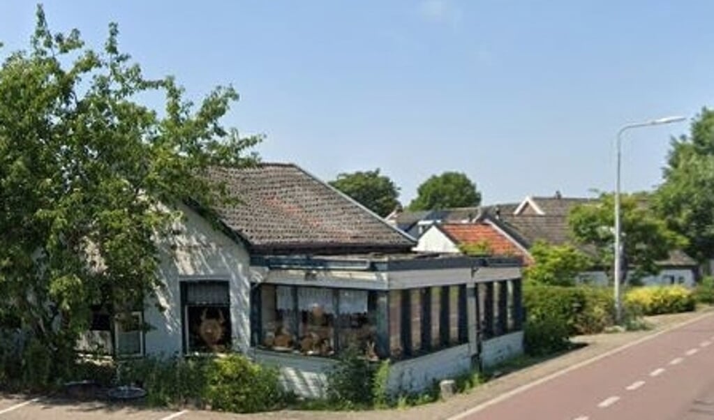 Het voormalige café De Zwarte Kat aan Amsteldijk Zuid.