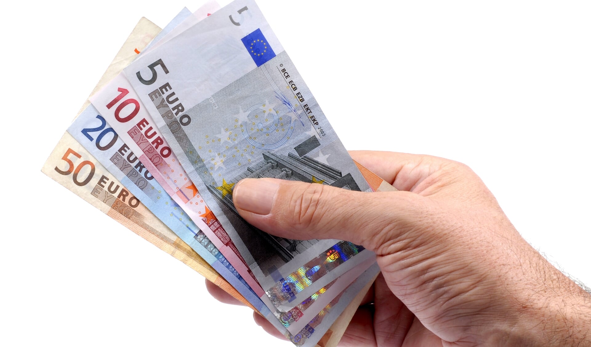 Selection of euro notes held in a male hand isolated on a white background.