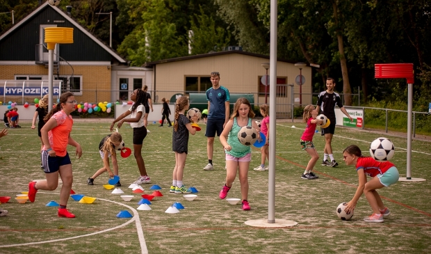 <p>,,Als je dan ook nog een veld vol met lachende kinderen voor je ziet, is het cirkeltje rond "</p>