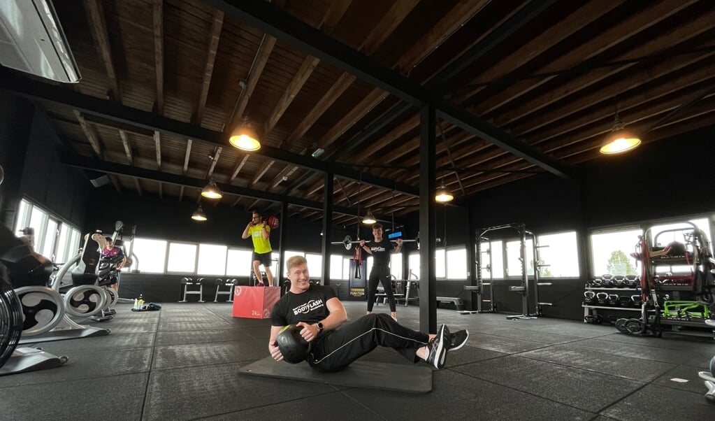 Fitnesstrainers van Bodyflash in actie in een van de nieuwe zalen.