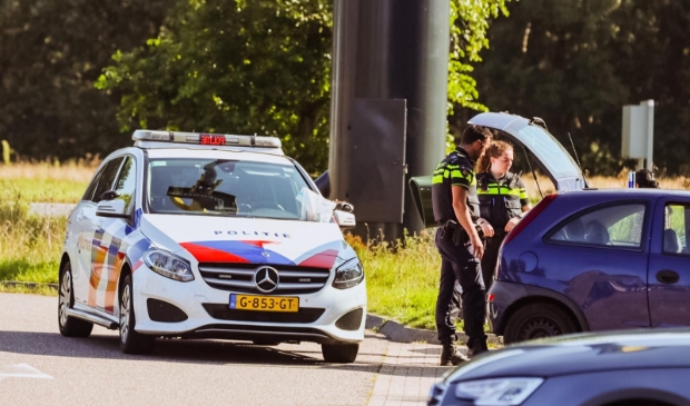 aanhouding; carpoolplaats; staandehouding; politie; arrestatie;