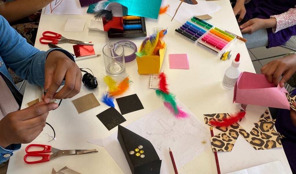 Kinderen aan het werk tijdens een vorige workshop.