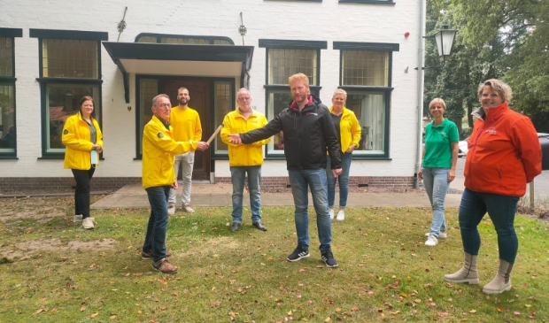 De overhandiging van het stokje van Marc aan Fernand