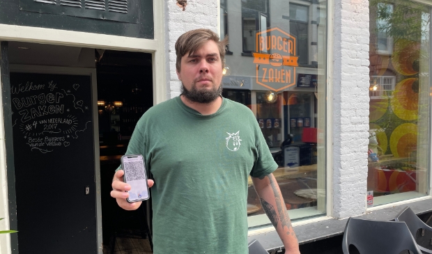 Het scannen van een QR-code voor een broodje hamburger ziet ondernemer Jort Brink niet zitten.