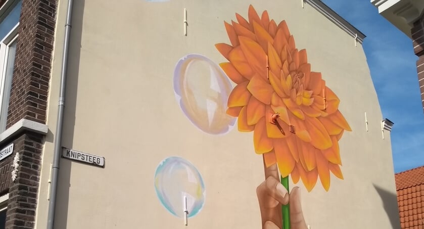 Het bordje verdween na het maken van de muurschildering