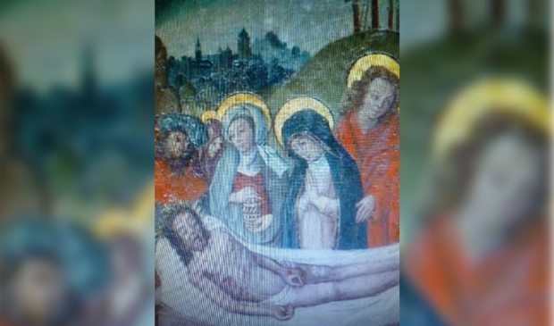 Schilderij van de Kruisafname van Jezus Christus in de Saint-Louis-en-l'Île Kerk in Parijs. De vrouw met de donderblauwe mantel is Maria.