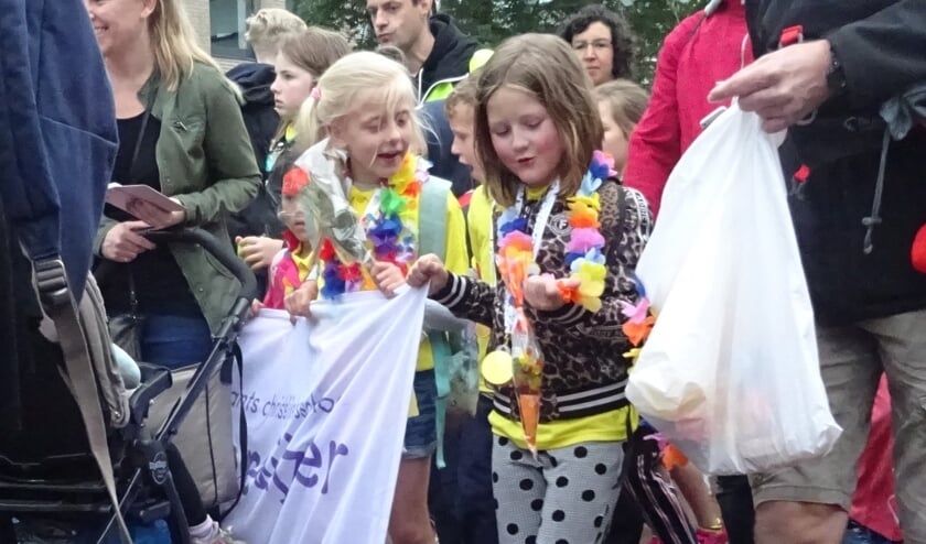 Bloemen en snoep voor de deelnemers