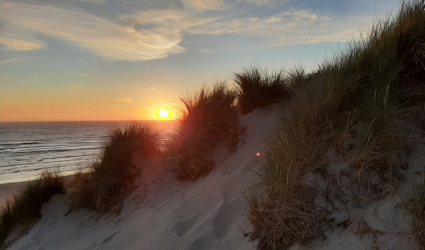 ,,Deze foto van de ondergaande zon is genomen op het strand van Ameland op 3 juni 2022.
